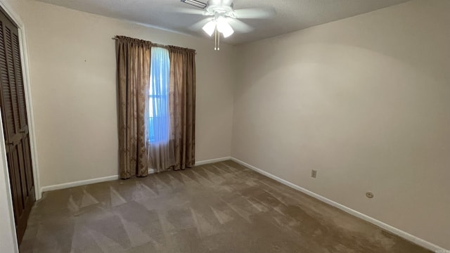 1410 Rock Creek Dr, Benton, AR 72019 - carpeted spare room with baseboards and ceiling fan