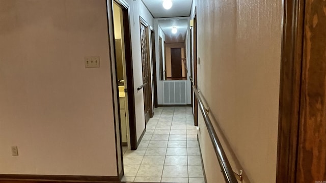 1410 Rock Creek Dr, Benton, AR 72019 - hall featuring light tile patterned floors and baseboards
