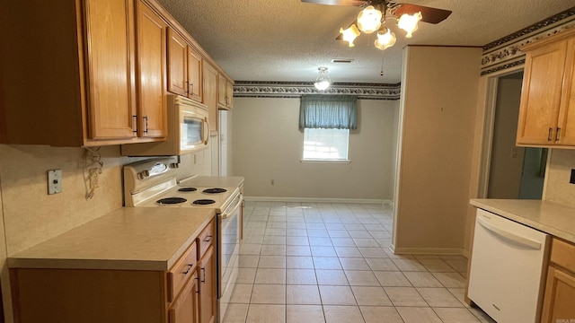 1410 Rock Creek Dr, Benton, AR 72019 - kitchen featuring white appliances, light countertops, a ceiling fan, a textured ceiling, and baseboards