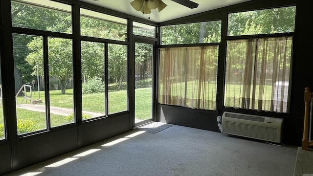 1410 Rock Creek Dr, Benton, AR 72019 - unfurnished sunroom featuring a ceiling fan, lofted ceiling, and a wall unit AC