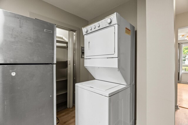 1720 W 19, Little Rock, AR 72202 - laundry area with stacked washer / dryer and light wood-type flooring