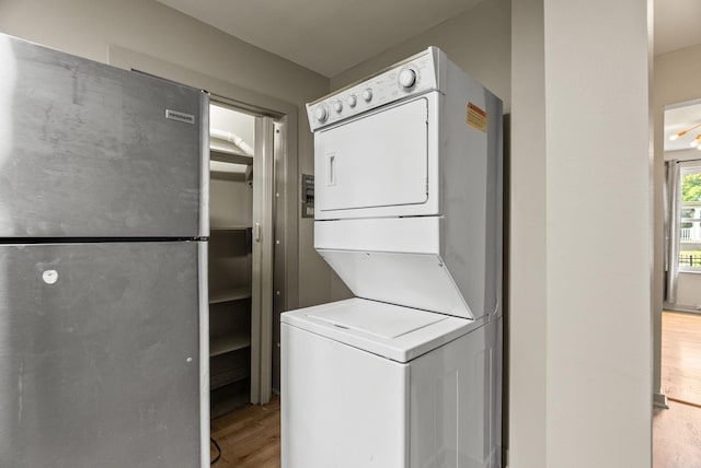 1724 W 19, Little Rock, AR 72202 - clothes washing area with estacked washer and dryer and light wood finished floors