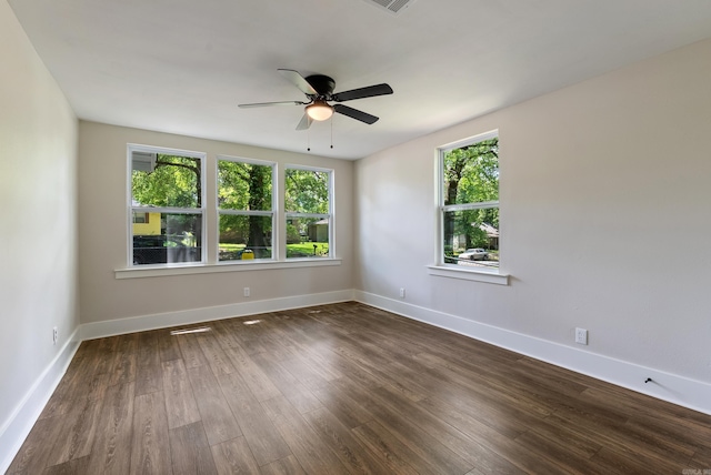 4300 W 16th St, Little Rock, AR 72204 - unfurnished room with healthy amount of natural light, a ceiling fan, wood finished floors, and baseboards
