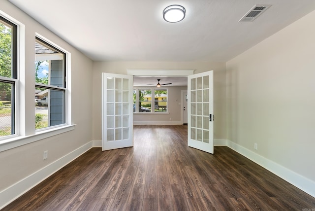 4300 W 16th St, Little Rock, AR 72204 - spare room with french doors, dark wood-style floors, baseboards, and a ceiling fan