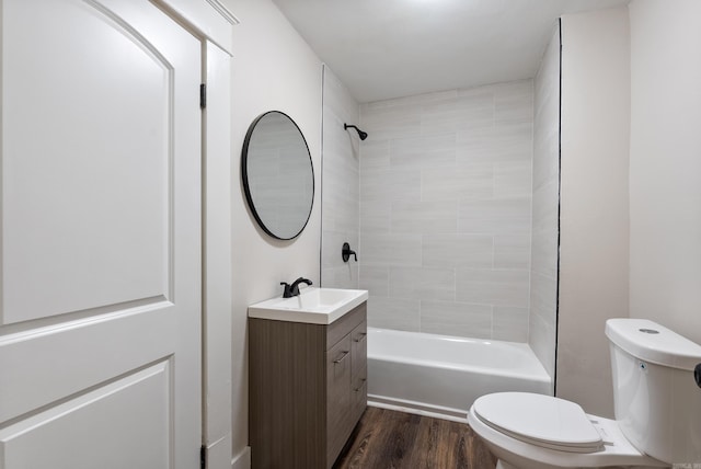 4300 W 16th St, Little Rock, AR 72204 - bathroom with toilet, wood finished floors, vanity, and shower / bath combination