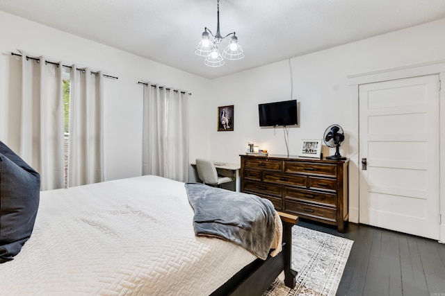428 W S St, Benton, AR 72015 - bedroom featuring dark wood-type flooring and a chandelier