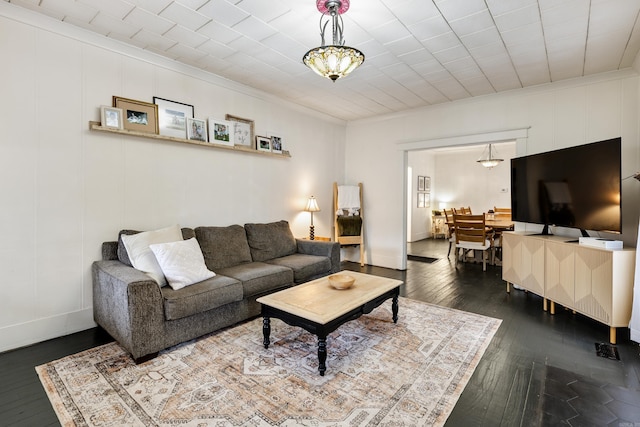 428 W S St, Benton, AR 72015 - living area featuring dark wood-style floors, crown molding, baseboards, and a chandelier