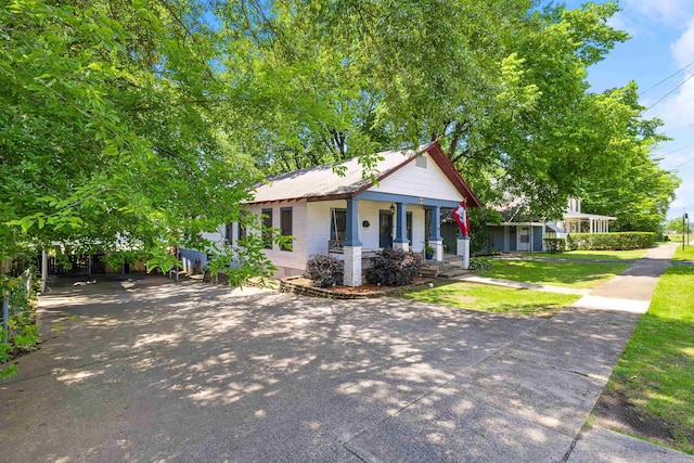 428 W S St, Benton, AR 72015 - view of front of house with a porch and a front yard
