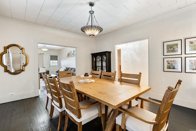428 W S St, Benton, AR 72015 - dining area with dark wood-style flooring, crown molding, and baseboards