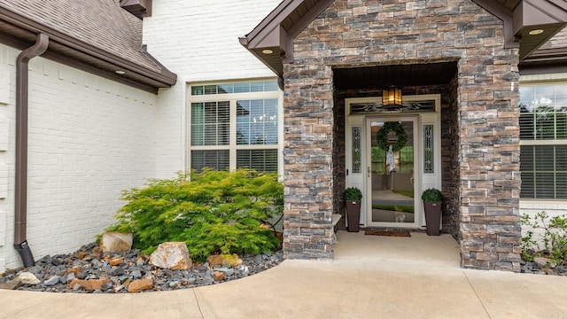216 Lake Valley Dr, Maumelle, AR 72113 - doorway to property featuring stone siding
