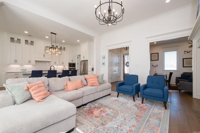 7021 Fields Dr, Alexander, AR 72019 - living room with a chandelier, dark wood-type flooring, recessed lighting, and crown molding