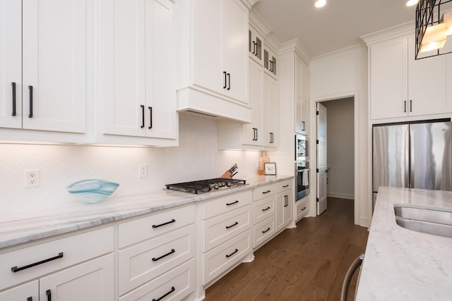 7021 Fields Dr, Alexander, AR 72019 - kitchen featuring stainless steel appliances, white cabinetry, backsplash, light stone countertops, and recessed lighting