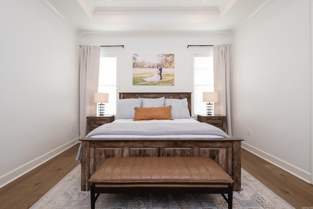 7021 Fields Dr, Alexander, AR 72019 - bedroom featuring a tray ceiling, multiple windows, wood finished floors, and ornamental molding