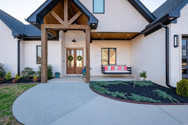 7021 Fields Dr, Alexander, AR 72019 - property entrance with french doors and brick siding
