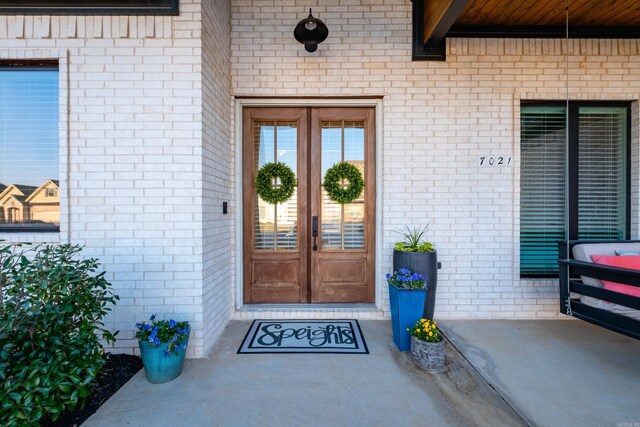 7021 Fields Dr, Alexander, AR 72019 - entrance to property featuring french doors and brick siding