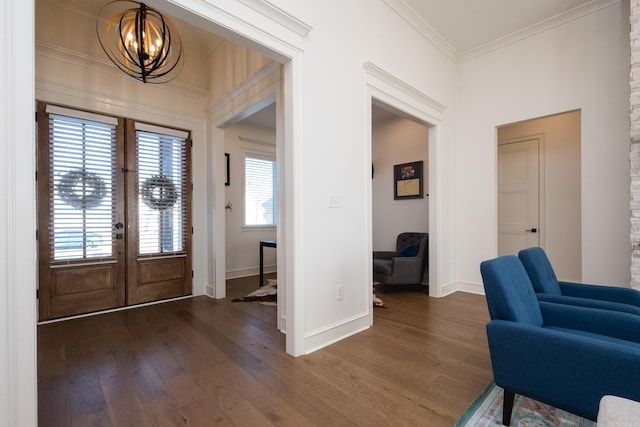 7021 Fields Dr, Alexander, AR 72019 - foyer with a chandelier, crown molding, dark wood-style floors, and baseboards