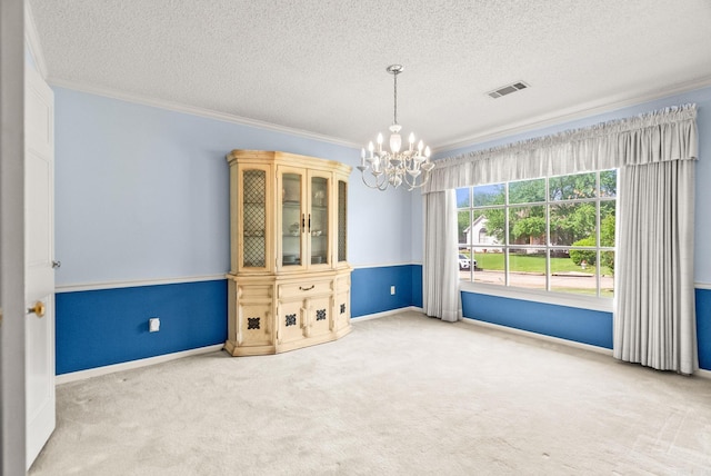 9 Leeward Ct, Maumelle, AR 72113 - unfurnished room with a chandelier, carpet flooring, crown molding, a textured ceiling, and baseboards