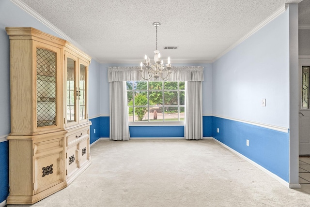 9 Leeward Ct, Maumelle, AR 72113 - unfurnished room featuring a chandelier, carpet floors, a textured ceiling, crown molding, and baseboards