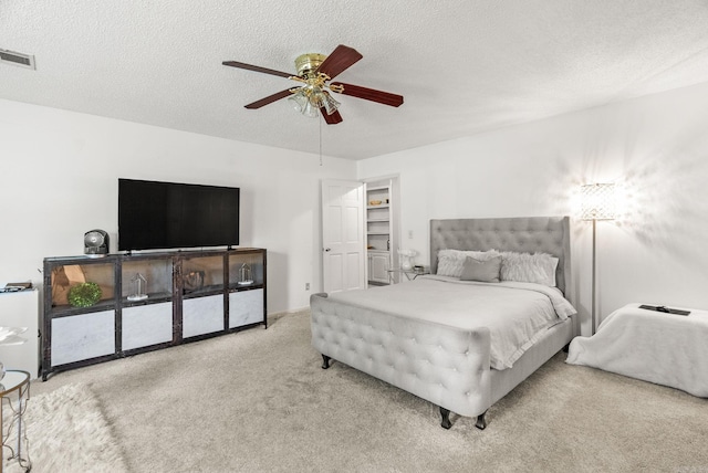 9 Leeward Ct, Maumelle, AR 72113 - bedroom with carpet, a textured ceiling, and a ceiling fan