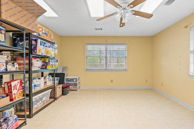 9 Leeward Ct, Maumelle, AR 72113 - storage room featuring a ceiling fan