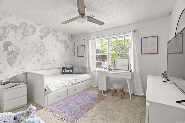 9 Leeward Ct, Maumelle, AR 72113 - bedroom featuring a textured ceiling, light colored carpet, and ceiling fan