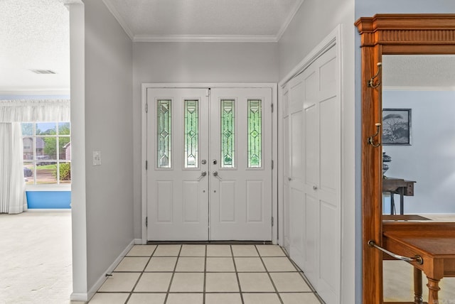 9 Leeward Ct, Maumelle, AR 72113 - foyer featuring a textured ceiling, crown molding, and baseboards