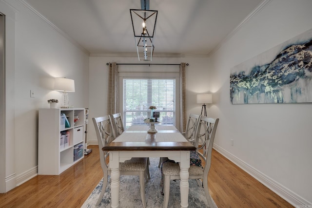 4715 Stockton Rd, Conway, AR 72034 - dining space featuring ornamental molding, light wood-type flooring, and baseboards