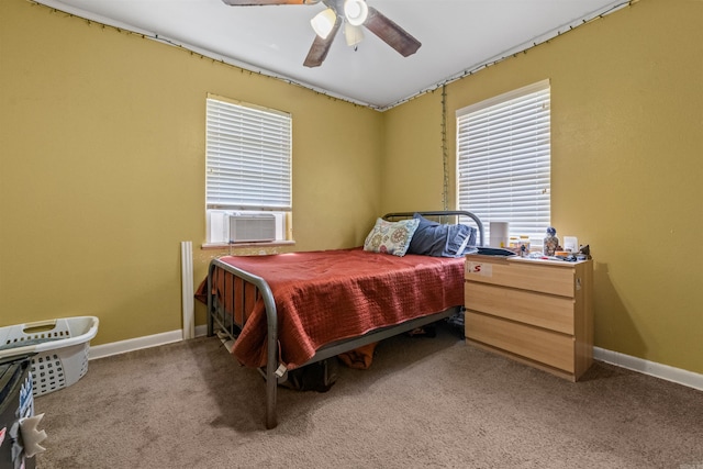 1217 Look St, Little Rock, AR 72204 - carpeted bedroom featuring cooling unit, baseboards, and ceiling fan