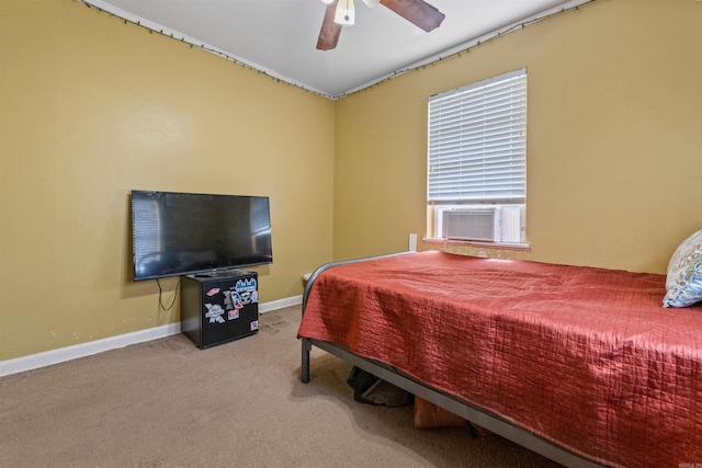 1217 Look St, Little Rock, AR 72204 - bedroom with carpet flooring, cooling unit, baseboards, and ceiling fan