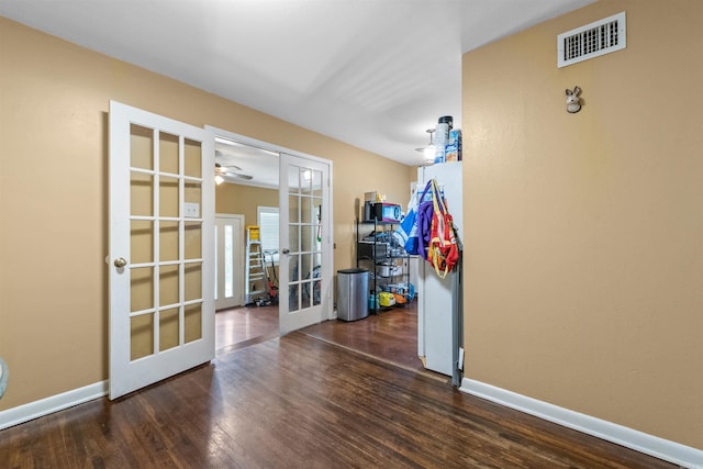 1217 Look St, Little Rock, AR 72204 - unfurnished room with french doors, wood finished floors, baseboards, and ceiling fan