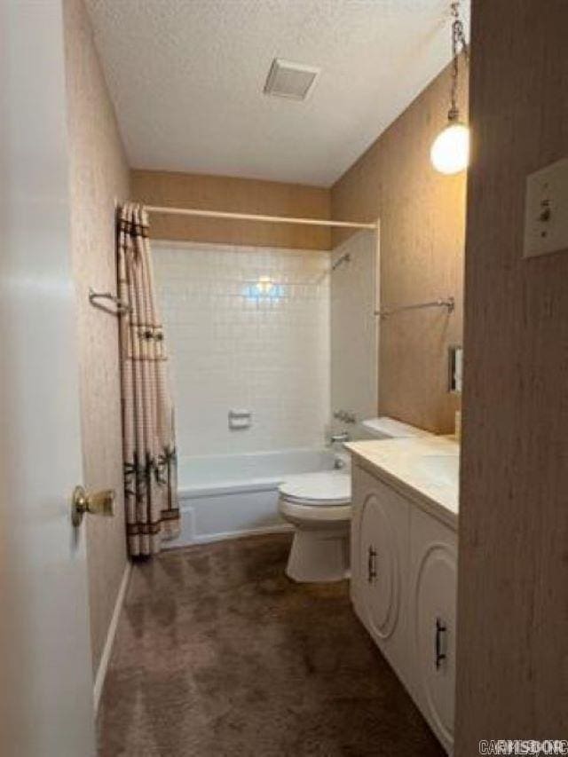 600 Higdon Ferry Rd Unit 203, Hot Springs, AR 71913 - bathroom featuring toilet, vanity, shower / bathtub combination with curtain, and a textured ceiling