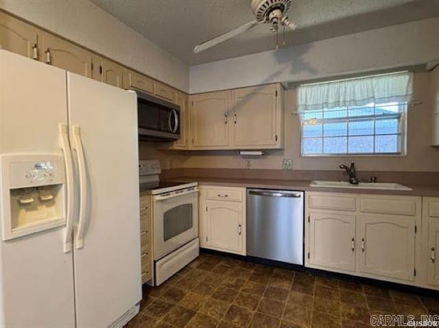 600 Higdon Ferry Rd Unit 203, Hot Springs, AR 71913 - kitchen featuring appliances with stainless steel finishes, a sink, ceiling fan, and white cabinetry