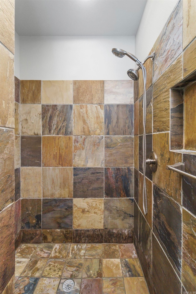 7 Galope Pl, Hot Springs Village, AR 71909 - bathroom with tiled shower and stone finish flooring