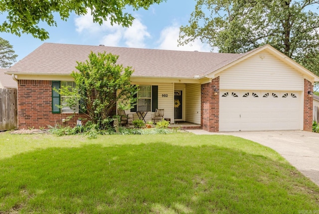 single story home featuring a porch, brick siding, an attached garage, and concrete driveway