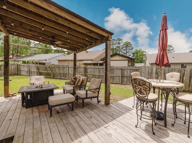 wooden deck featuring outdoor dining area