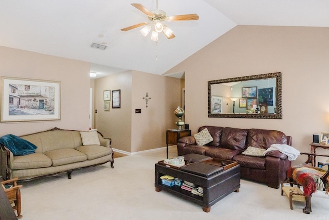 carpeted living area with vaulted ceiling and ceiling fan