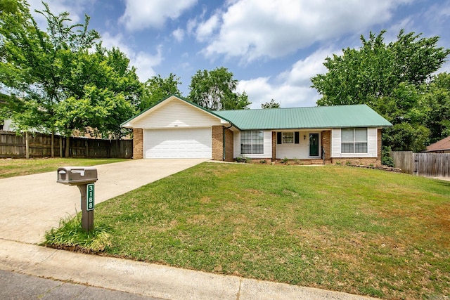 single story home featuring brick siding, an attached garage, concrete driveway, and metal roof