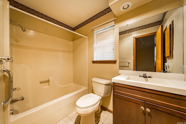 full bathroom with tile patterned flooring, toilet, vanity, and tub / shower combination
