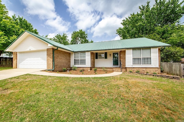 ranch-style house featuring an attached garage, concrete driveway, brick siding, metal roof, and a porch