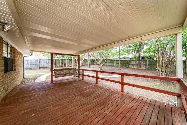 deck featuring a fenced backyard
