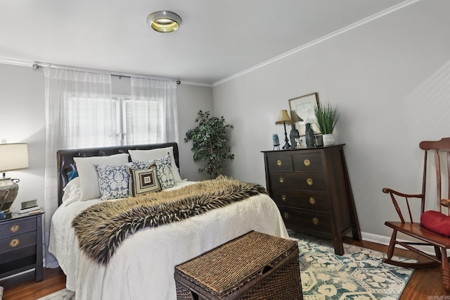 717 Choctaw Cir, Little Rock, AR 72205 - bedroom with wood finished floors, ornamental molding, and baseboards