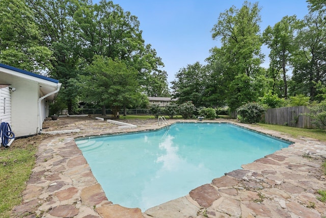 717 Choctaw Cir, Little Rock, AR 72205 - view of swimming pool featuring a fenced backyard and a patio