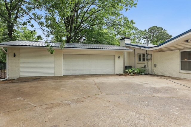 717 Choctaw Cir, Little Rock, AR 72205 - view of front of property featuring brick siding and an attached garage