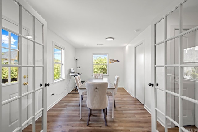 38 Lefever Ln, Little Rock, AR 72227 - dining room featuring french doors and wood finished floors