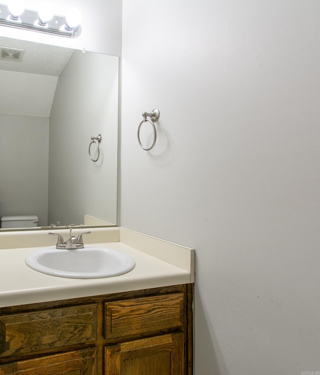 200 Pine Frst Unit F3, Maumelle, AR 72113 - half bathroom featuring vanity and toilet