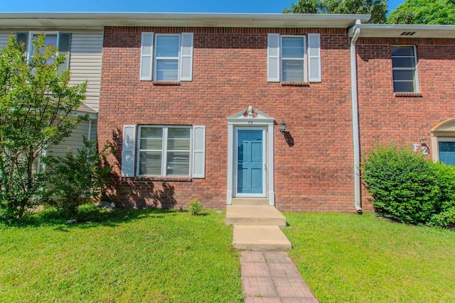 200 Pine Frst Unit F3, Maumelle, AR 72113 - view of front of property with a front yard and brick siding