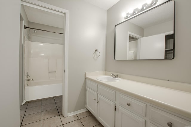 200 Pine Frst Unit F3, Maumelle, AR 72113 - full bathroom featuring vanity, tile patterned flooring, shower / bath combination, and baseboards