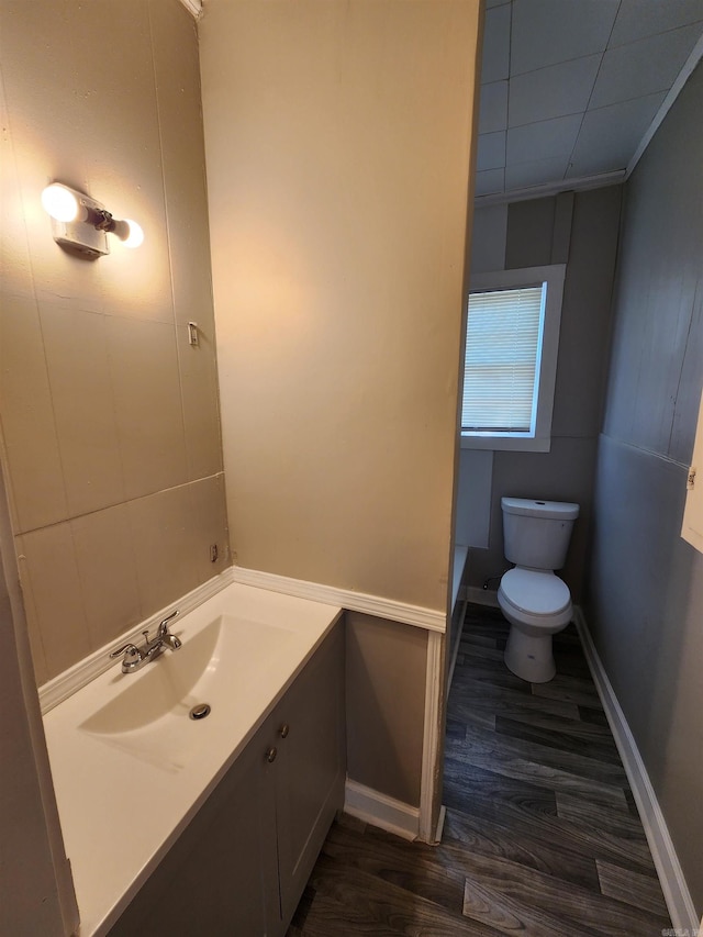 3716 Marion St, North Little Rock, AR 72118 - half bath with toilet, wood finished floors, vanity, and baseboards