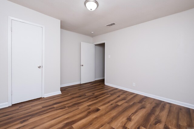 1101 W Charles Bussey Ave, Little Rock, AR 72206 - unfurnished bedroom with baseboards and wood finished floors