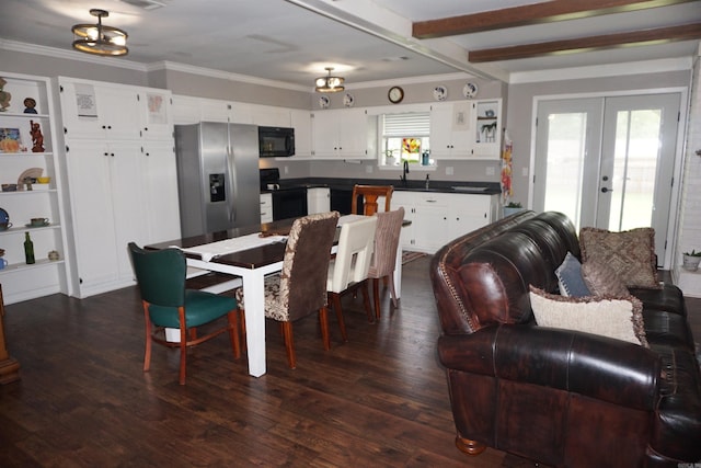 8 Tina Cir, Searcy, AR 72143 - dining space with french doors, dark wood finished floors, and crown molding